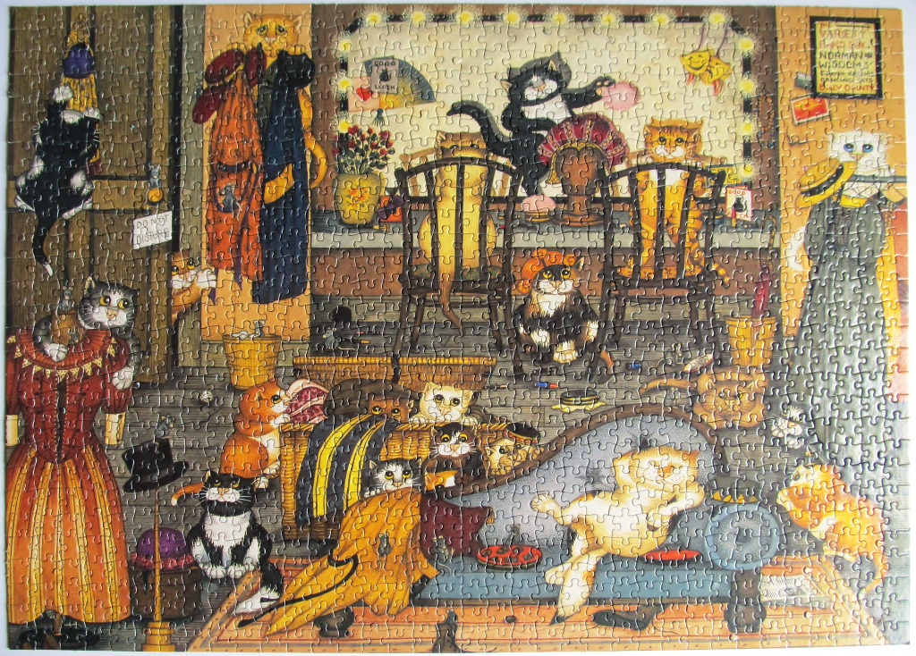 Illustration of cats in a messy theater dressing room
