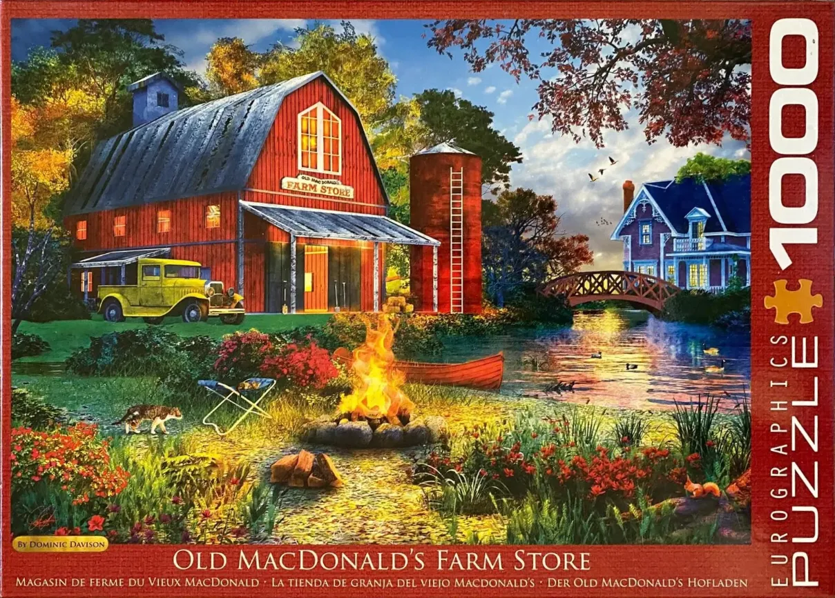 A rustic red farm store and yellow truck sit by a stream with a campfire in the foreground.