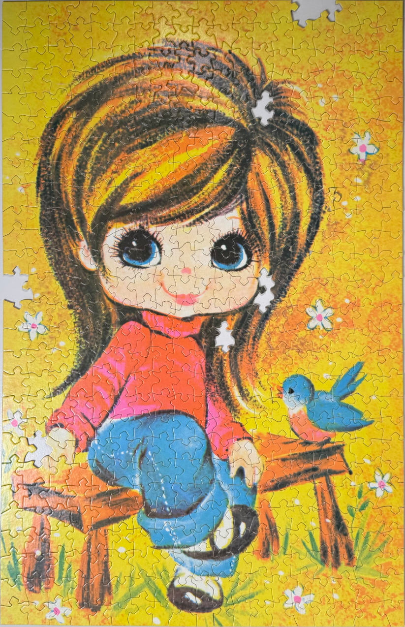 A whimsical illustration of a big-eyed girl with brown hair sitting on a wooden bench with a small blue bird.