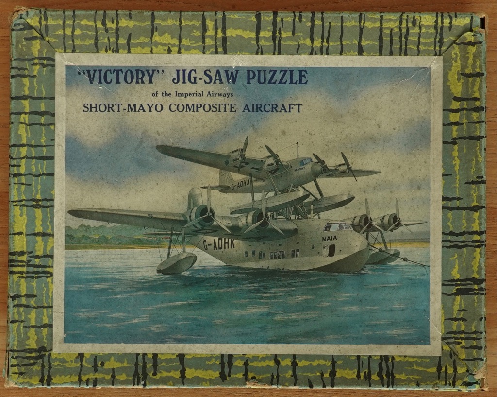Vintage illustration of the Short-Mayo Composite Aircraft floating on water.