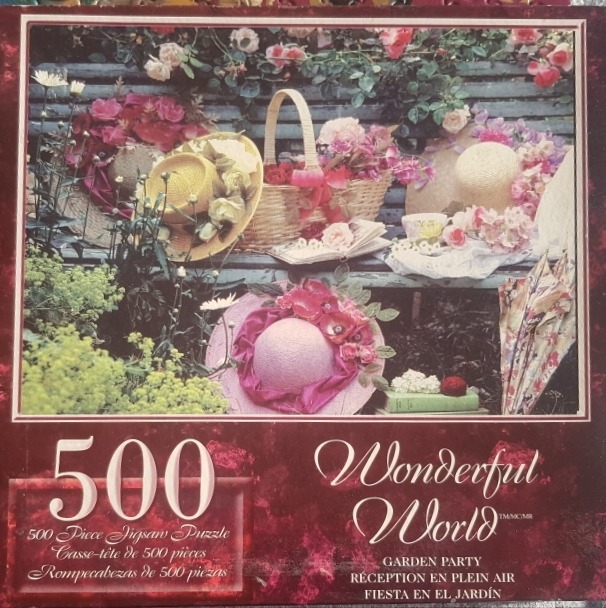 A romantic garden scene featuring decorated sun hats, baskets of flowers, and a vintage parasol on a weathered bench.
