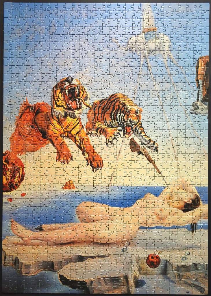 A surrealist painting of two tigers springing from a pomegranate above a sleeping woman by a sea.