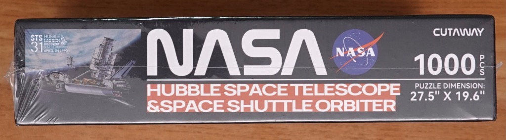 Space Shuttle Discovery launching Hubble Telescope.