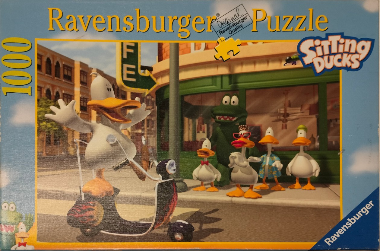A cartoon scene of a duck riding a scooter past a group of ducks and a crocodile standing in front of a cafe.
