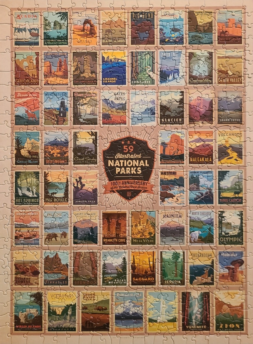 A grid of 59 illustrated national park postage-style stamps with a central commemorative shield.