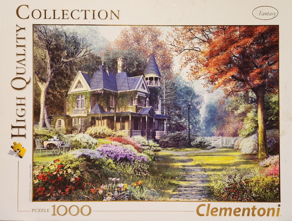 An idyllic Victorian house with a turret stands in a lush garden with a stone path and vibrant autumn foliage.