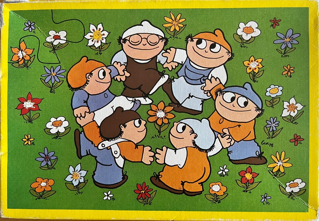 A cartoon illustration of five children in caps and simple clothes dancing in a circle on a green meadow with flowers.
