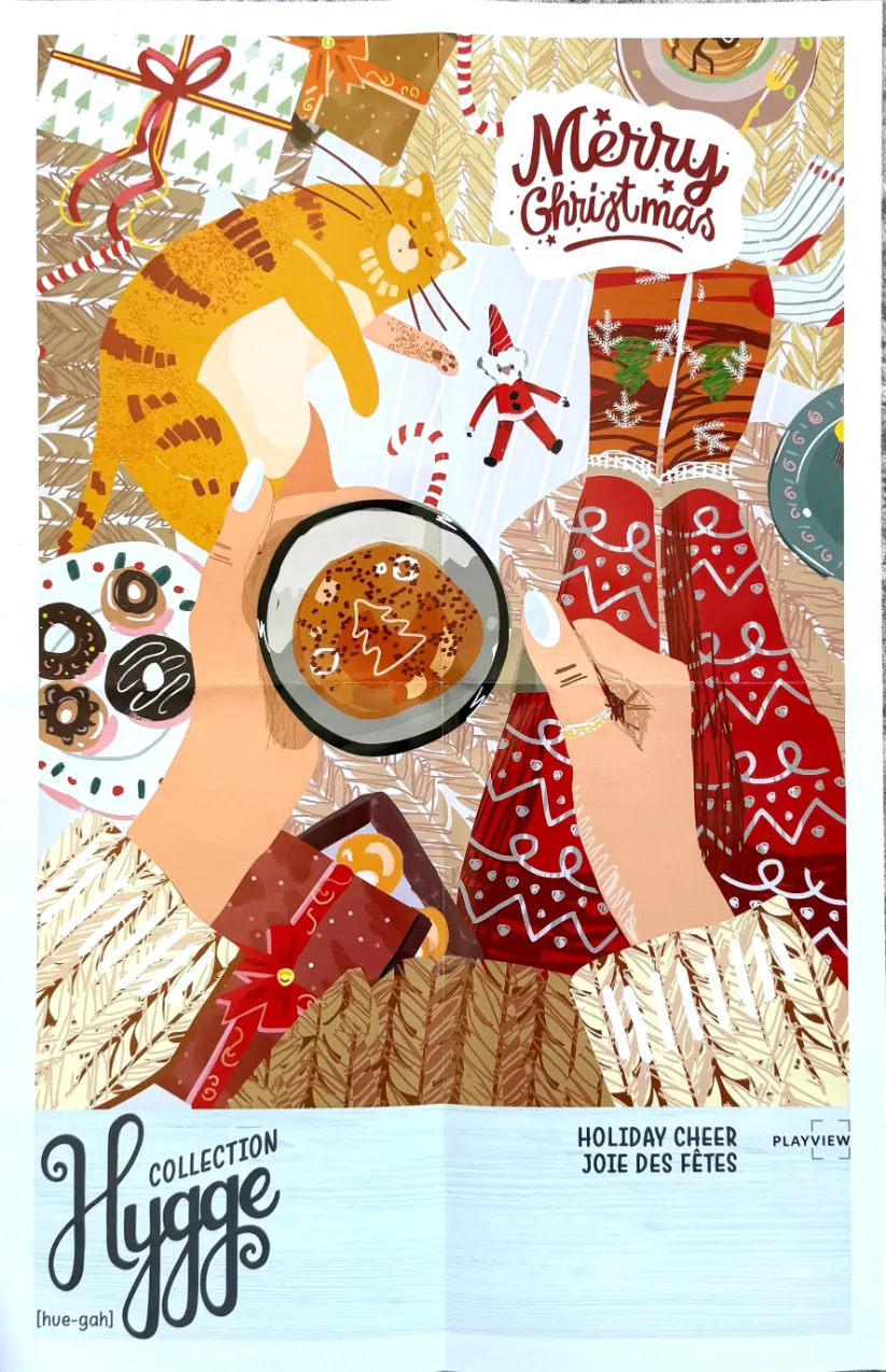 First-person view of someone sitting on a cozy rug with a cat, hot cocoa, and Christmas gifts.