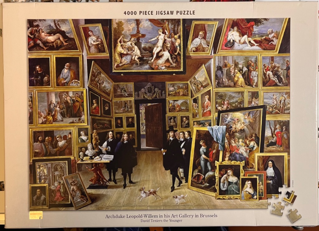 Classical oil painting depicting Archduke Leopold-Willem in an art gallery filled with framed paintings.