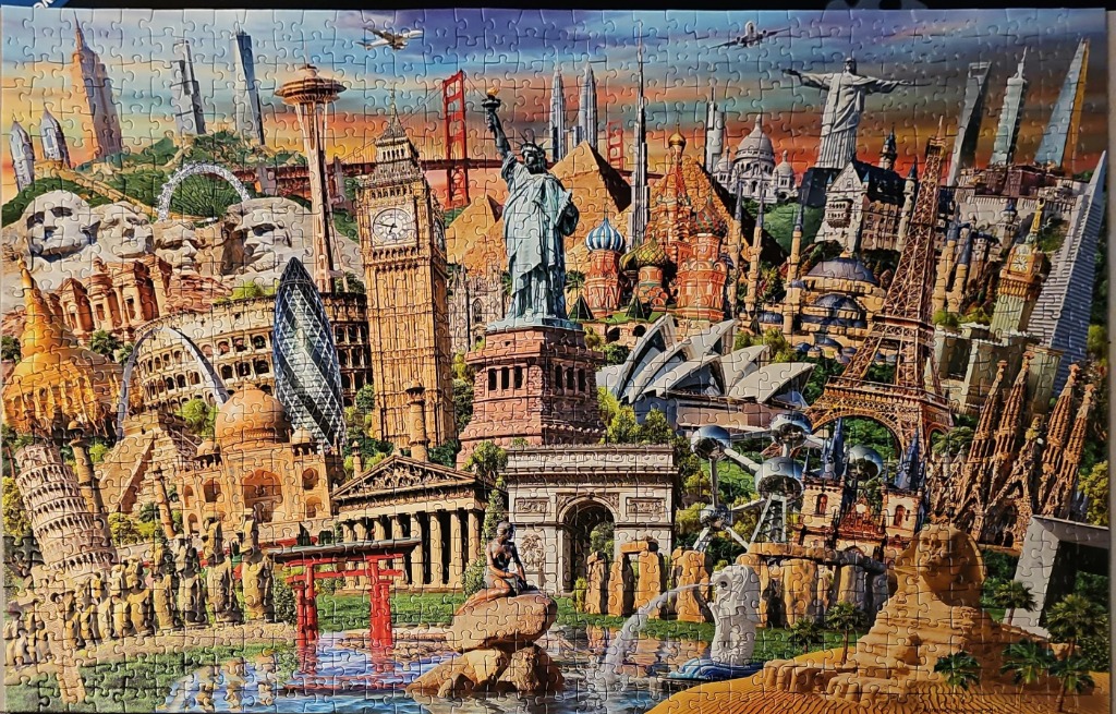 A montage of iconic global landmarks against a warm sunset sky.