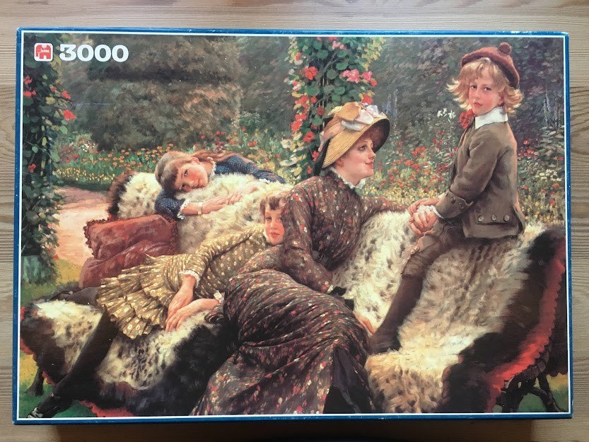 An oil painting of a woman and three children relaxing on a large fur rug in a lush garden.