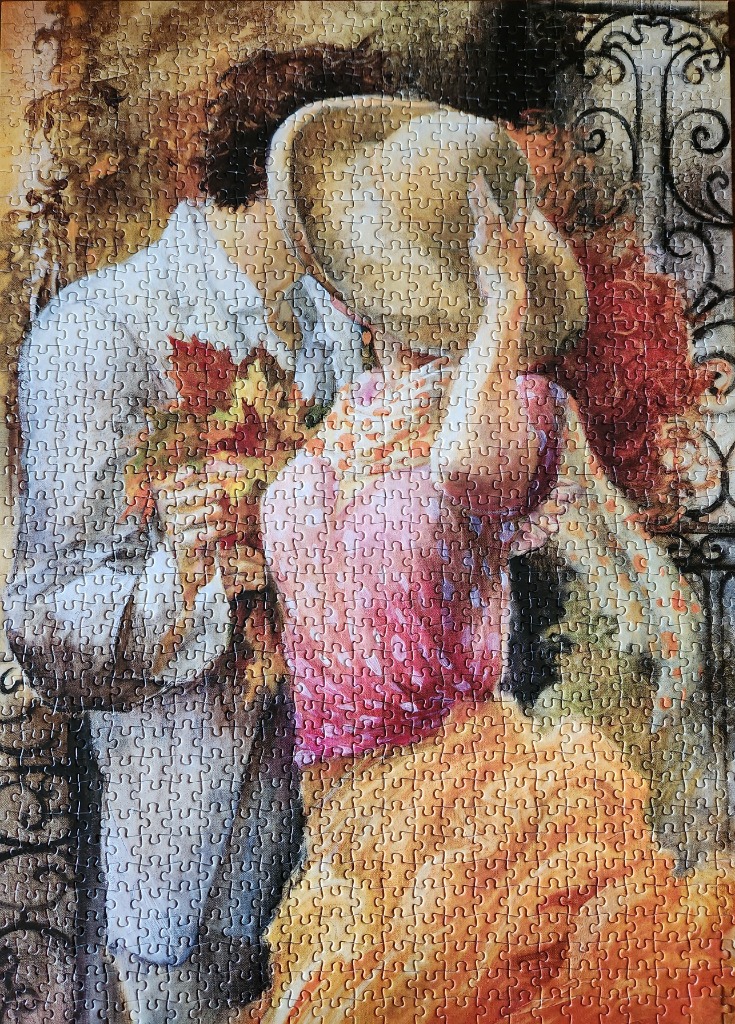 Romantic illustration of a couple sharing a kiss while holding a bouquet of autumn leaves.