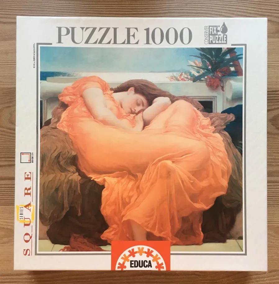 A painting of a woman with long dark hair sleeping in a bright orange dress, seated on a dark draped chair.