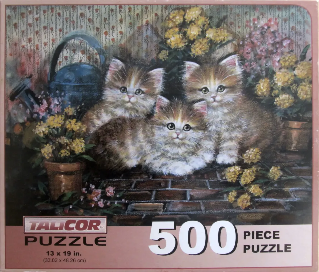 An oil-style painting of three fluffy kittens sitting among flower pots and a blue watering can.