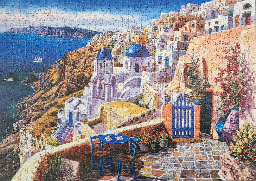 A painterly scene of Santorini, Greece featuring iconic blue-domed churches and a seaside terrace.