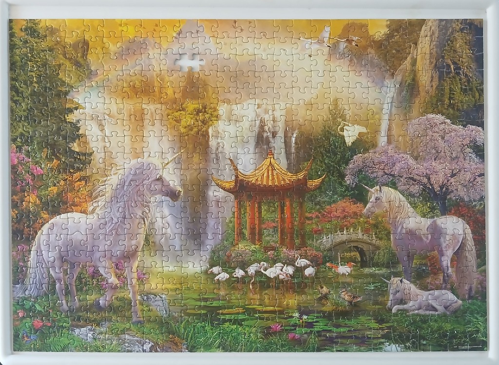 Fantasy scene featuring three white unicorns in a magical garden with a golden pavilion and waterfalls.