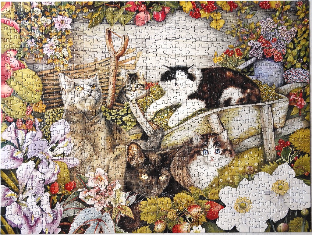 A detailed illustration of four cats lounging in a vibrant, flower-filled garden.