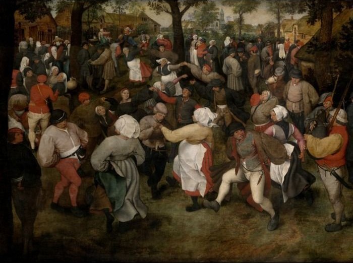 A lively outdoor scene with a large crowd of peasants dancing in a village clearing.