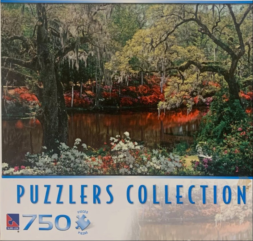 A lush Southern garden with live oaks, Spanish moss, and vibrant red azaleas reflected in a dark pond.