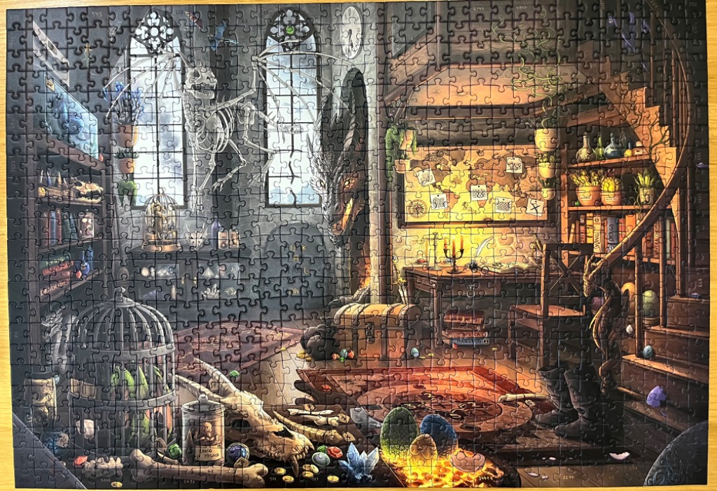 Fantasy wizard's study with dragon skeleton, map, books, and glowing eggs.