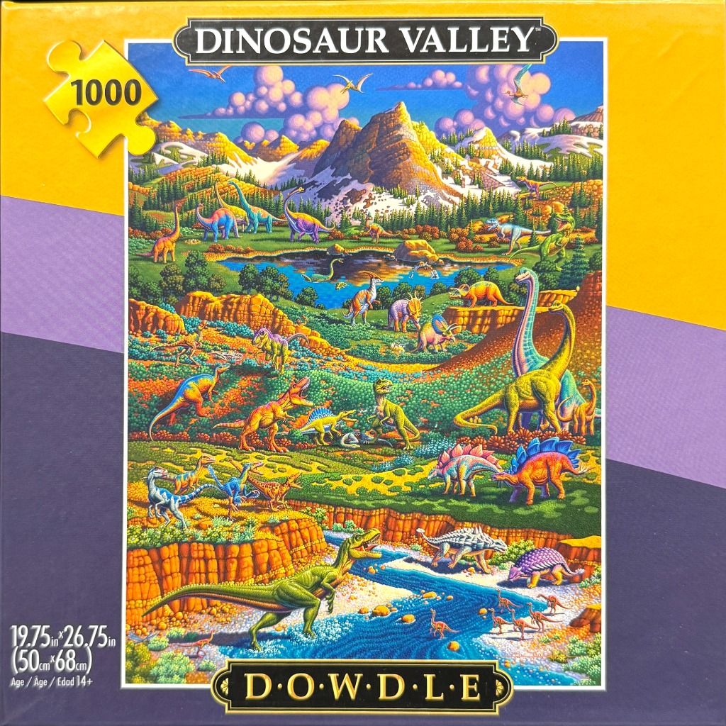 A lush, colorful prehistoric valley landscape filled with various species of dinosaurs under a clear blue sky.