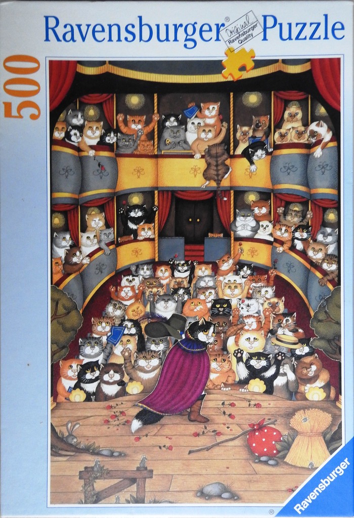 An illustration of a theater audience filled with cats, with a cat dressed as a Musketeer standing on stage.