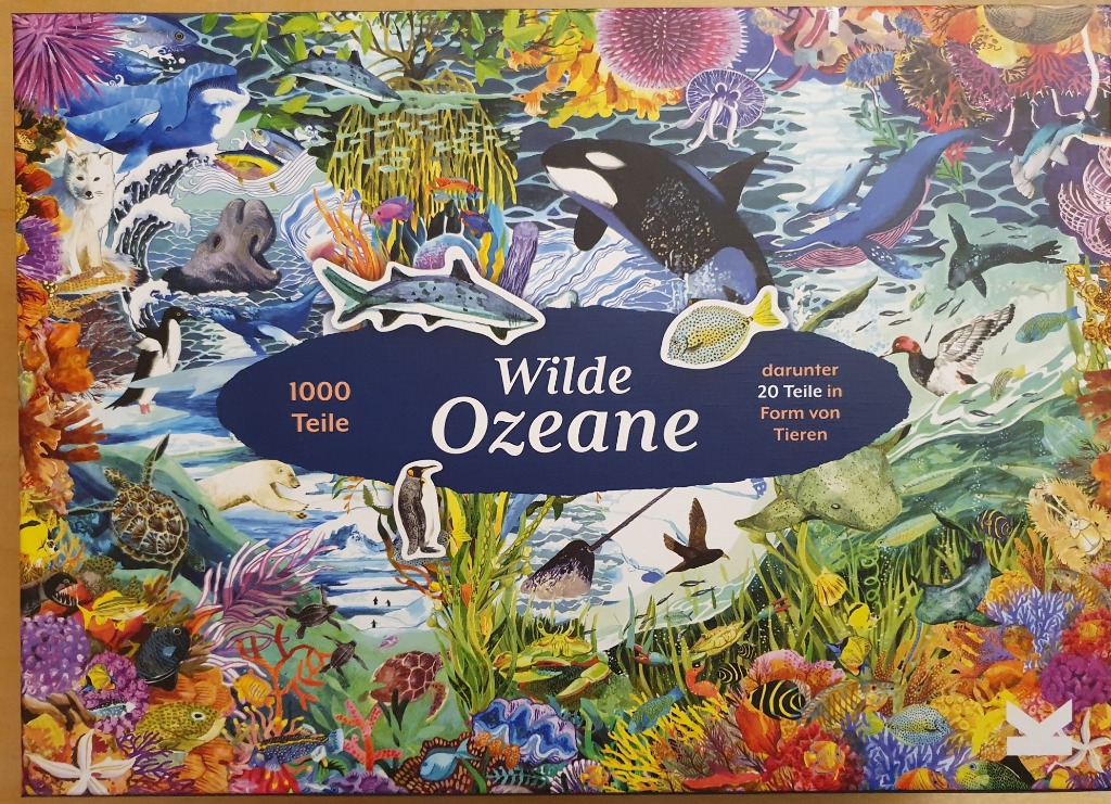 Collage of various marine life and arctic animals in a vibrant underwater scene