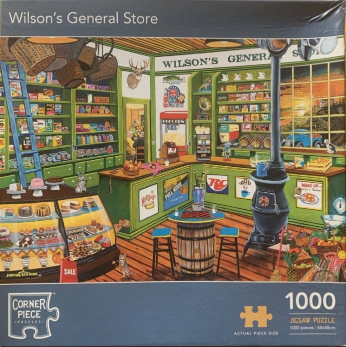 Interior view of Wilson's General Store with shelves of goods, a bakery counter, and a potbelly stove.