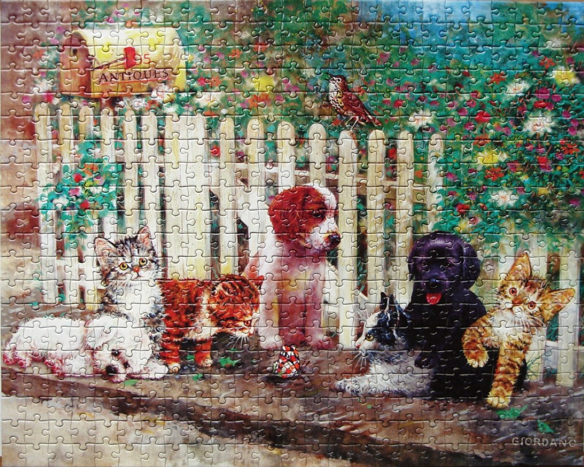A whimsical garden scene with four puppies and kittens sitting in front of a white picket fence.