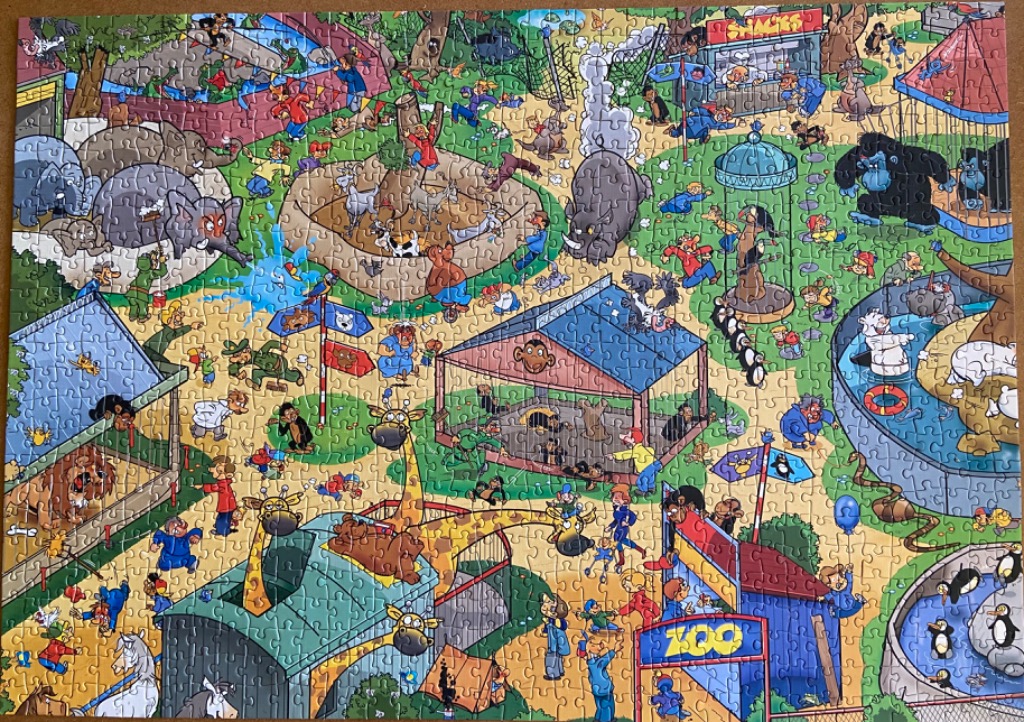 A busy cartoon illustration of a chaotic zoo scene with many animals and visitors.