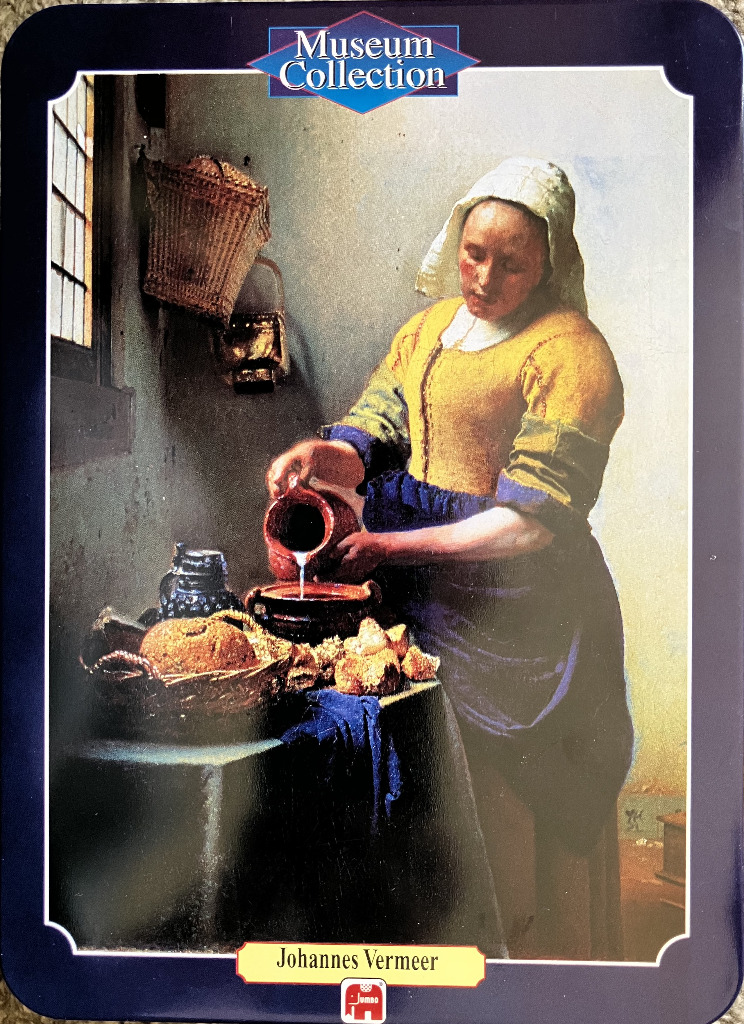 The Milkmaid by Johannes Vermeer, depicting a woman pouring milk into a bowl on a table.