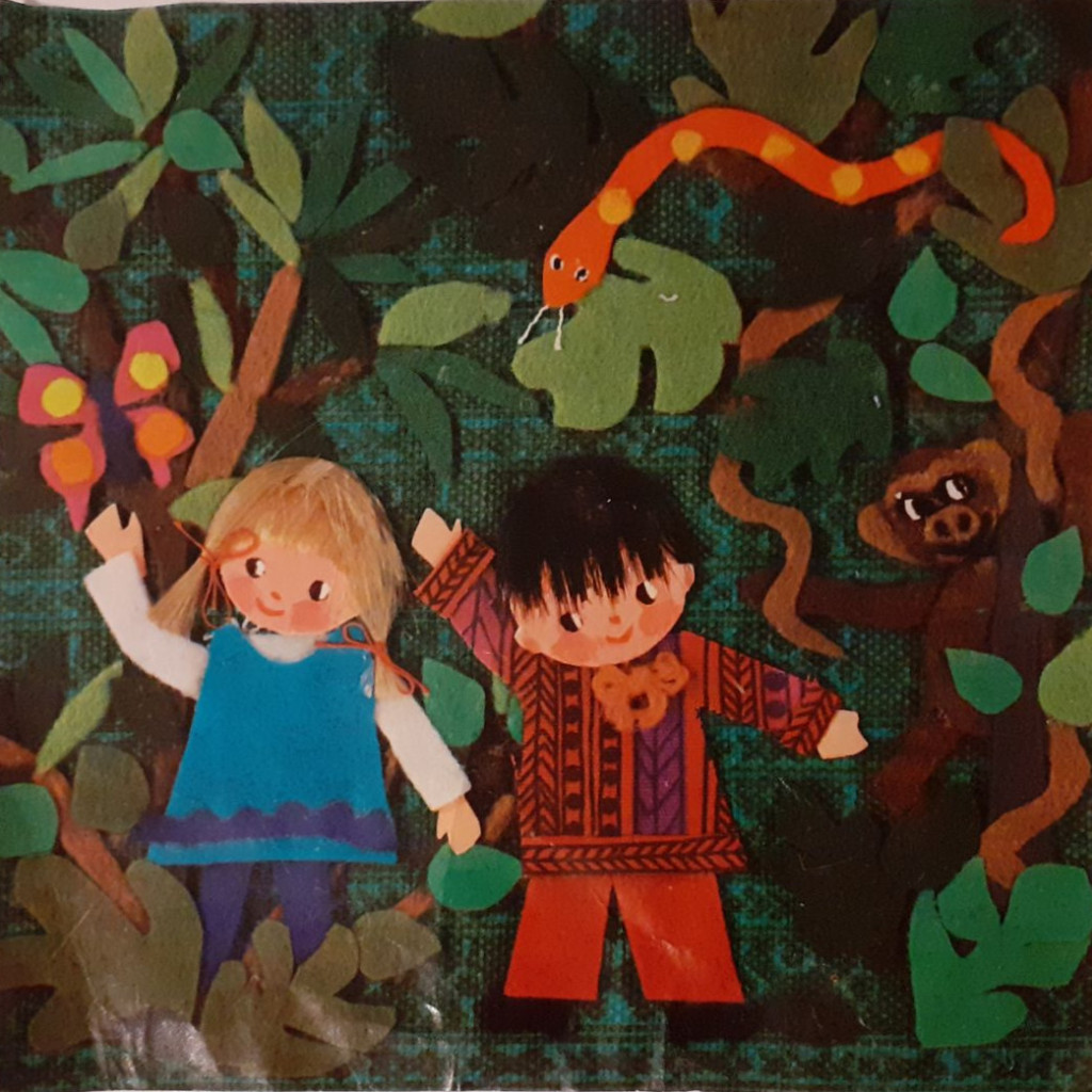 A felt collage depicting a girl and a boy in a jungle setting with a snake, monkey, and butterfly.