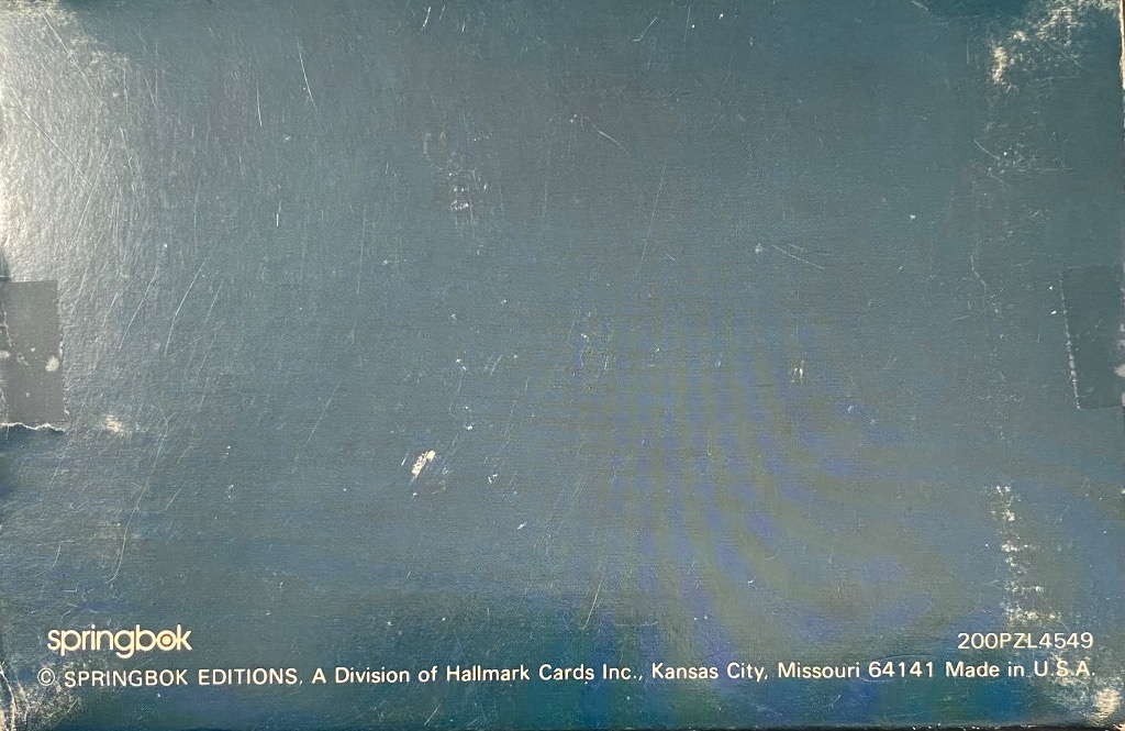 Dark blue textured background with white scuff marks and text.