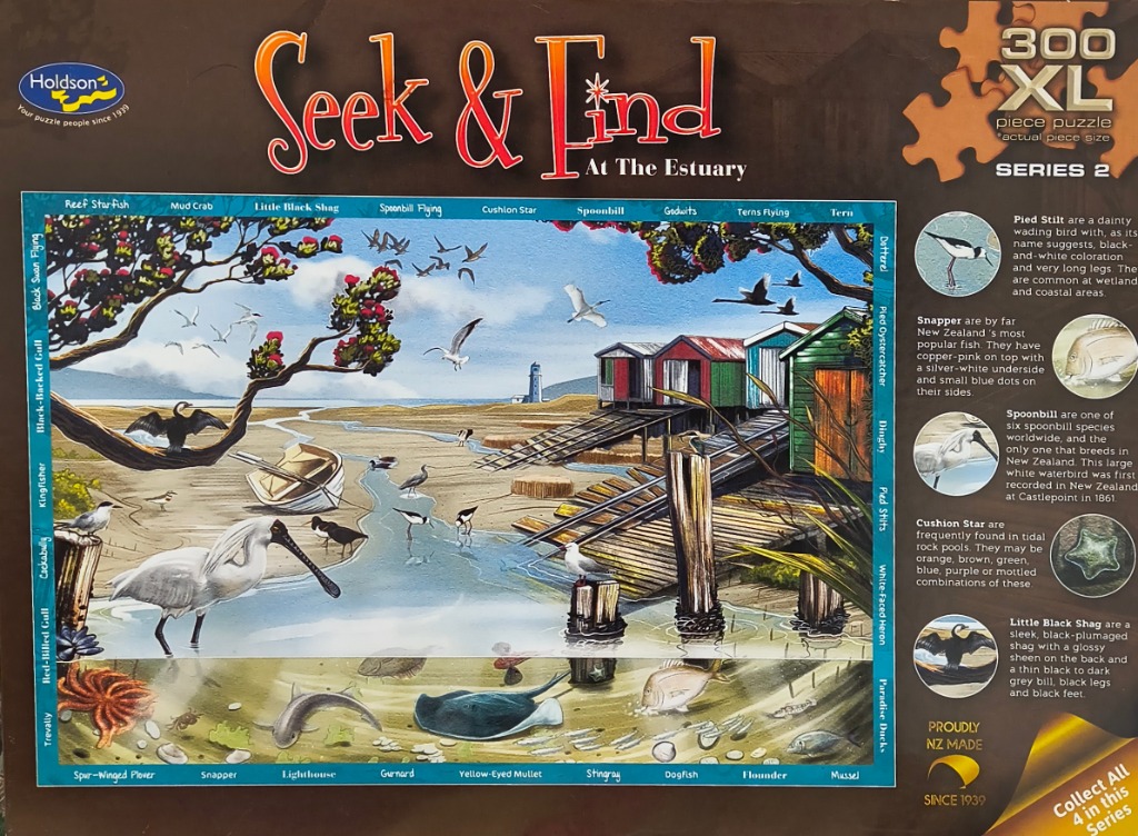 An illustration of an estuary featuring various birds, sea creatures, and a row of coastal sheds at low tide.