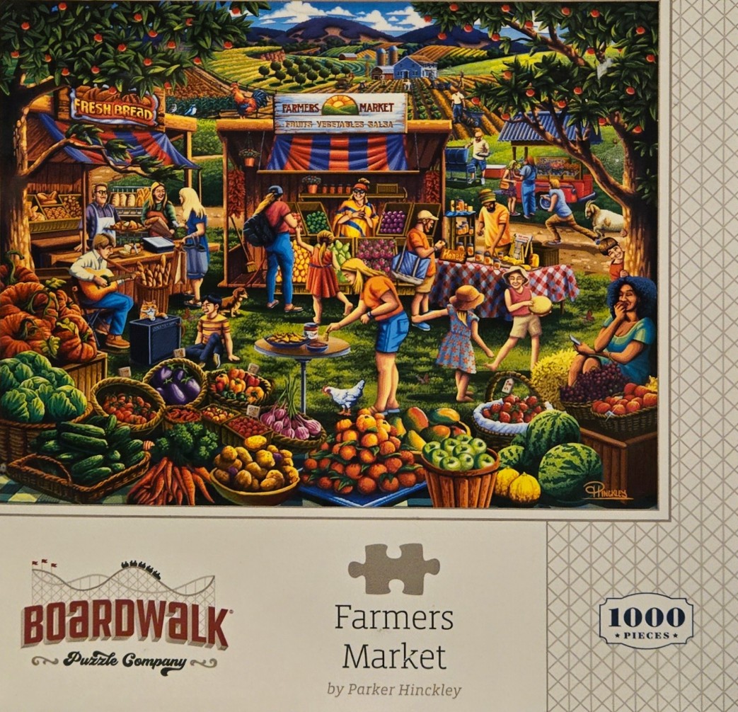 A lively outdoor farmers market scene with stalls, fresh produce, and people under a sunny blue sky.