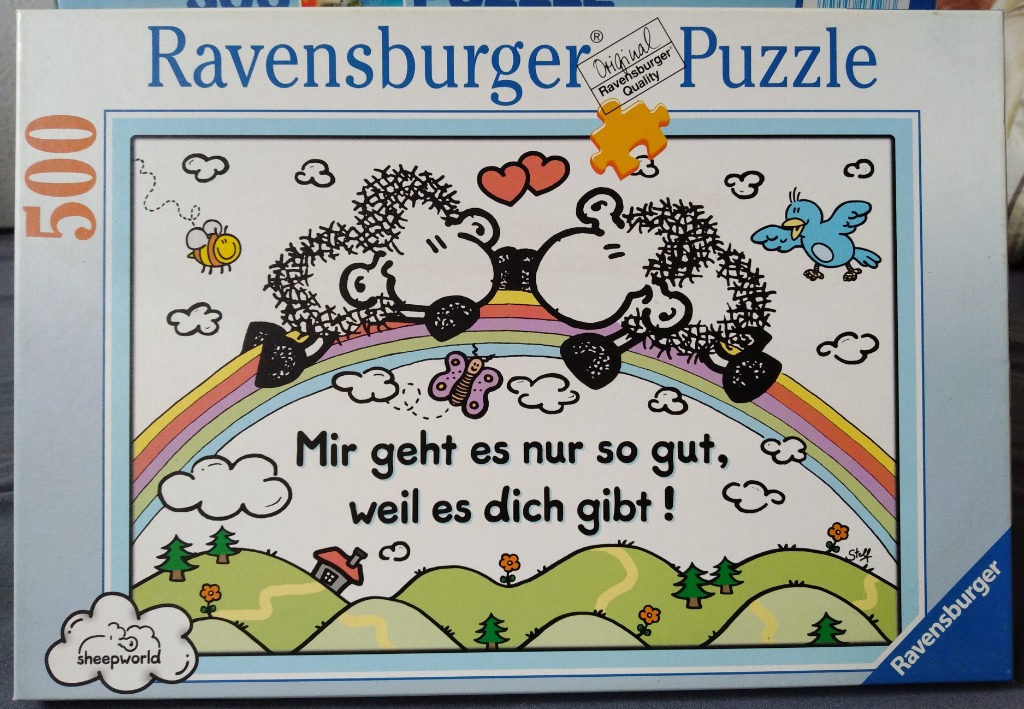Cartoon illustration of two fuzzy sheep kissing on a rainbow, with the German text: Mir geht es nur so gut, weil es dich gibt