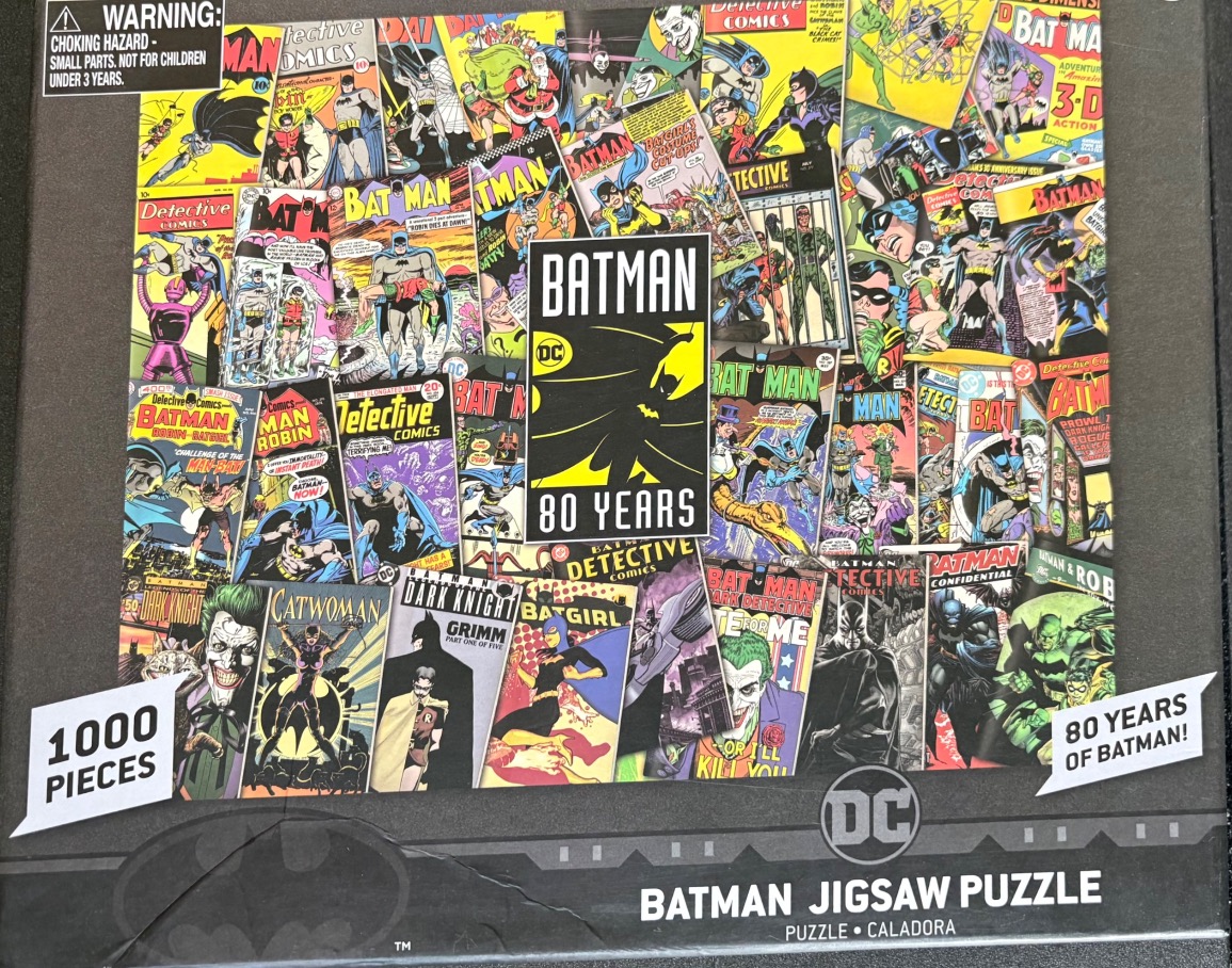 A collage of various classic vintage Batman comic book covers.
