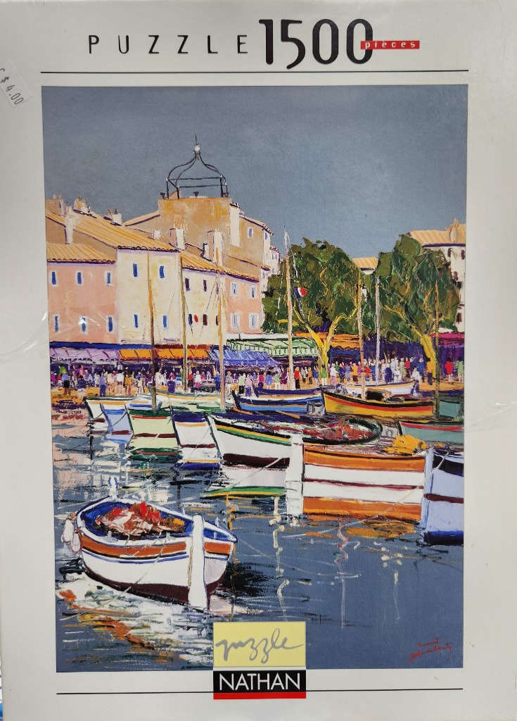 Impressionistic painting of a French harbor with colorful boats and Mediterranean buildings.