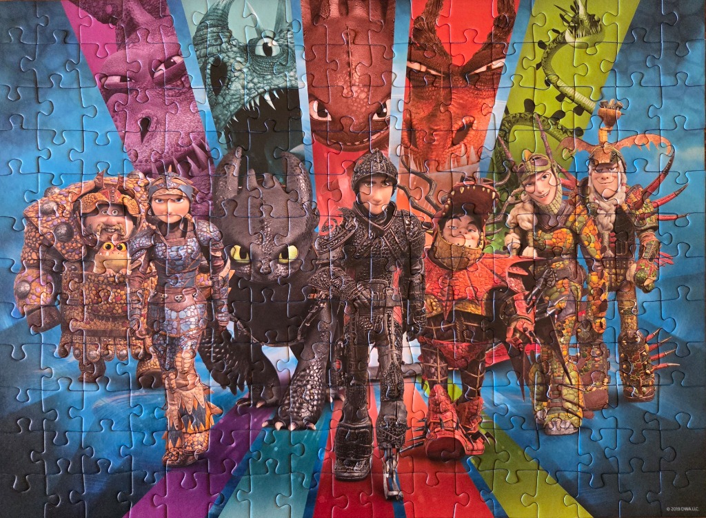 A group of dragon riders from How to Train Your Dragon posed in front of colorful vertical stripes.