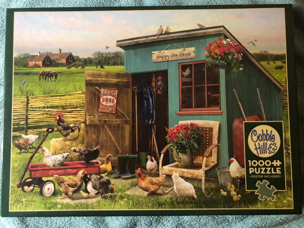 A peaceful farmyard scene featuring a rustic teal chicken coop surrounded by many hens and roosters.