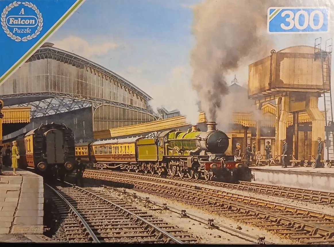 A nostalgic painting of a green steam locomotive pulling into a large, glass-roofed Victorian railway station.