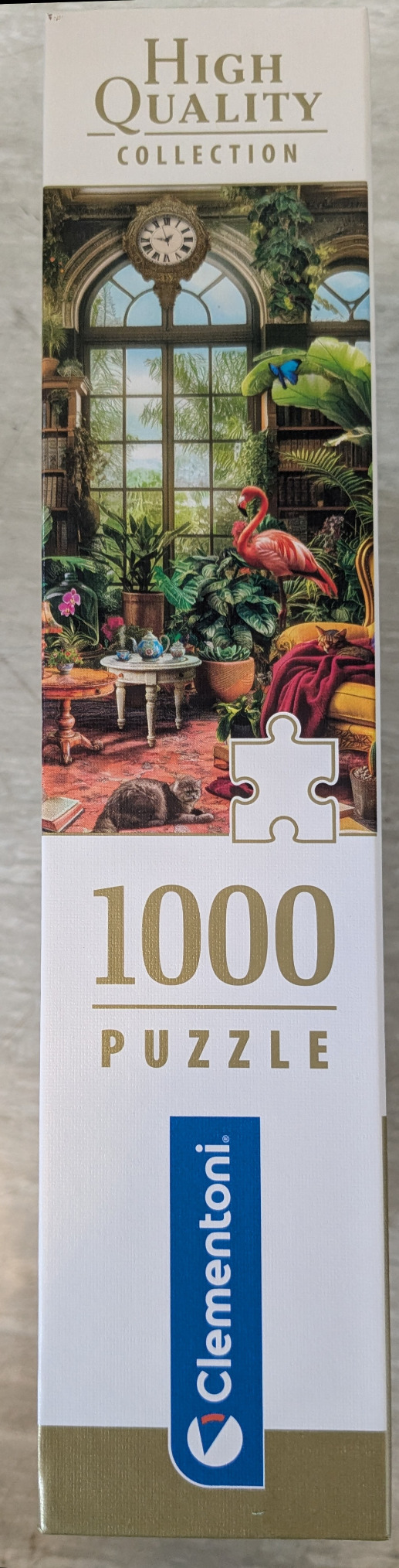An opulent sunroom with a flamingo, cats, and lush plants.