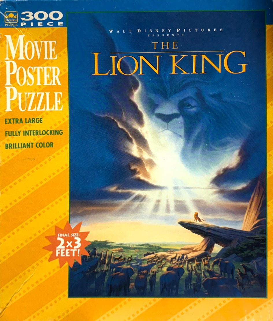 Movie poster of The Lion King with a large celestial face of Mufasa looming over Pride Rock and a savanna landscape.