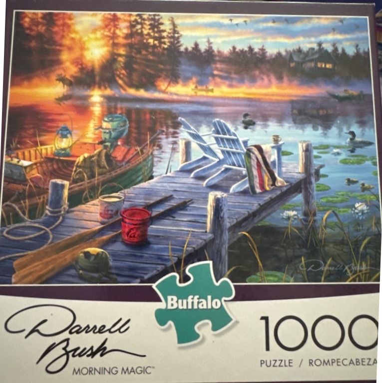 A sunrise scene with two Adirondack chairs on a wooden dock overlooking a calm lake, with a rowboat nearby.