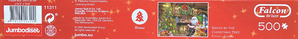 Santa by the Christmas Tree