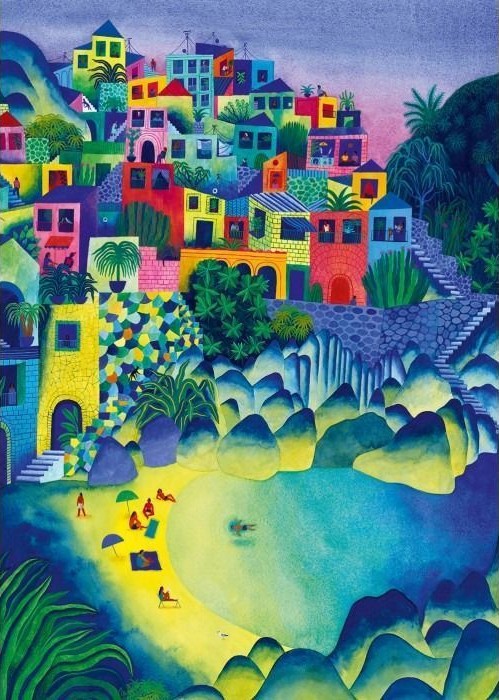 A colorful hillside village overlooks a turquoise cove and a small sandy beach.