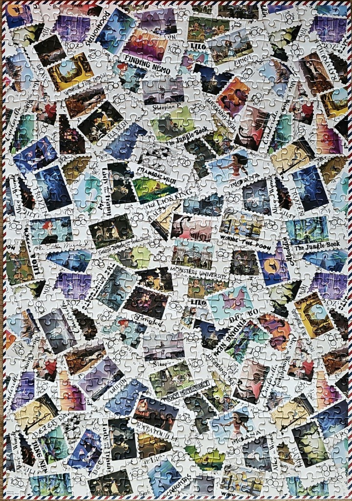 A collage of vintage-style postage stamps featuring various Disney and Pixar movie characters.