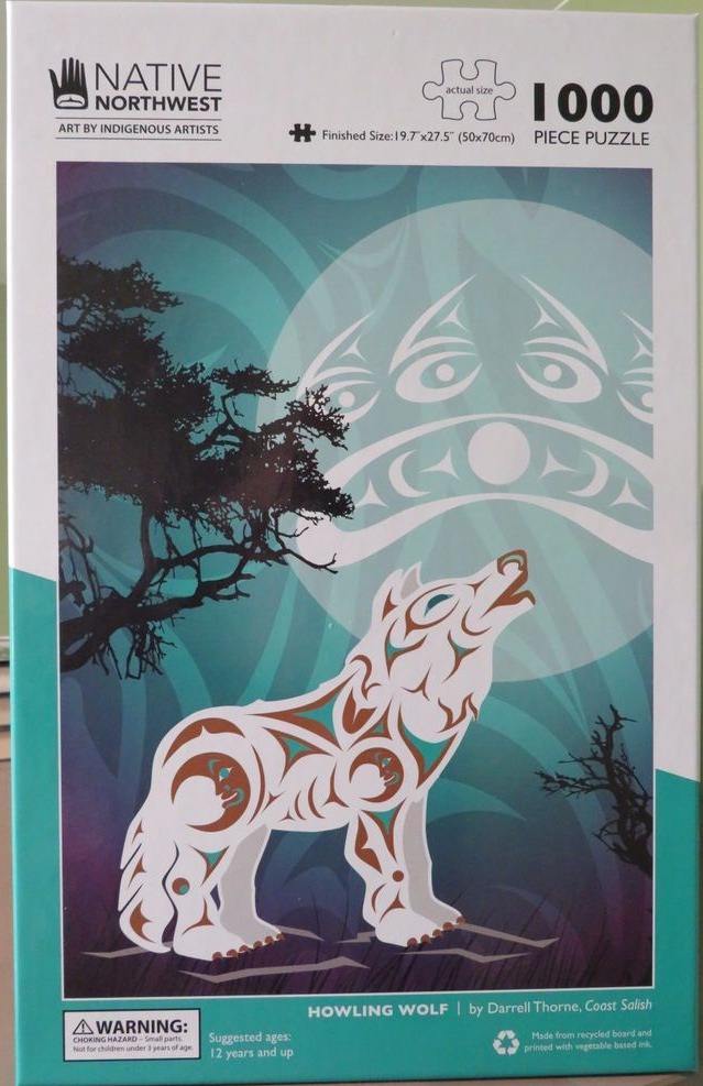Stylized graphic illustration of a white wolf howling under a large moon, featuring traditional Coast Salish design elements.