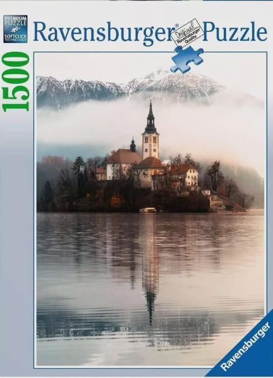 A peaceful photograph of the Pilgrimage Church of the Assumption of Mary on an island in Lake Bled, Slovenia.