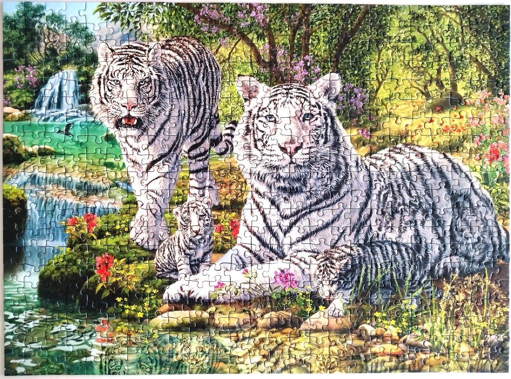 A family of four white tigers in a lush, sun-drenched jungle clearing with a waterfall.